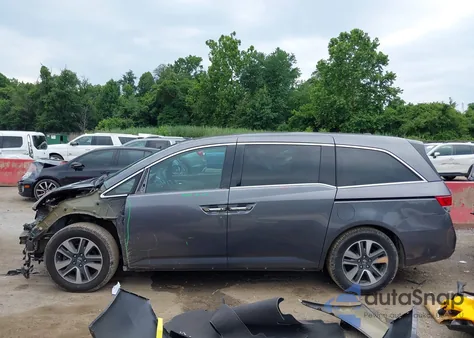 2015 Honda Odyssey Touring/Touring Elite z USA, uszkodzony, nr VIN 5FNRL5H99FB009627